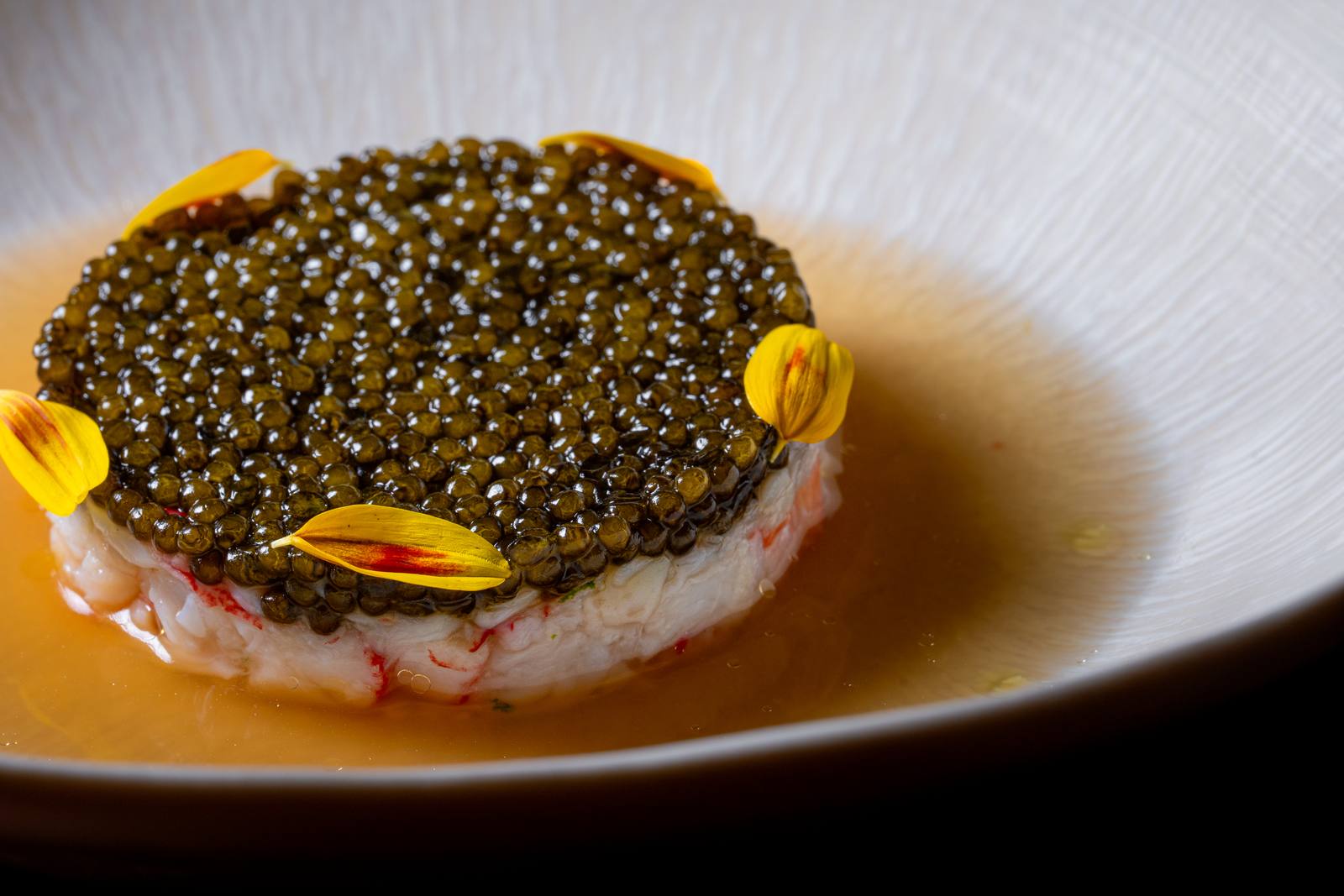 A caviar-topped course at Auro. The restaurant presents a seven-course tasting menu drawing on Napa Valley’s seasonal ingredients, according to Four Seasons.