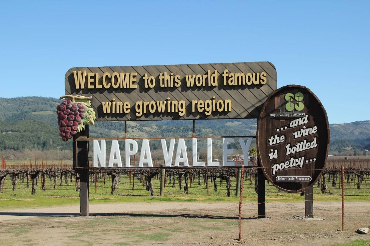 The welcome sign on Highway 29. The valley's wine identity is the region's calling card, and it is why so many newcomers arrive in the first place.
