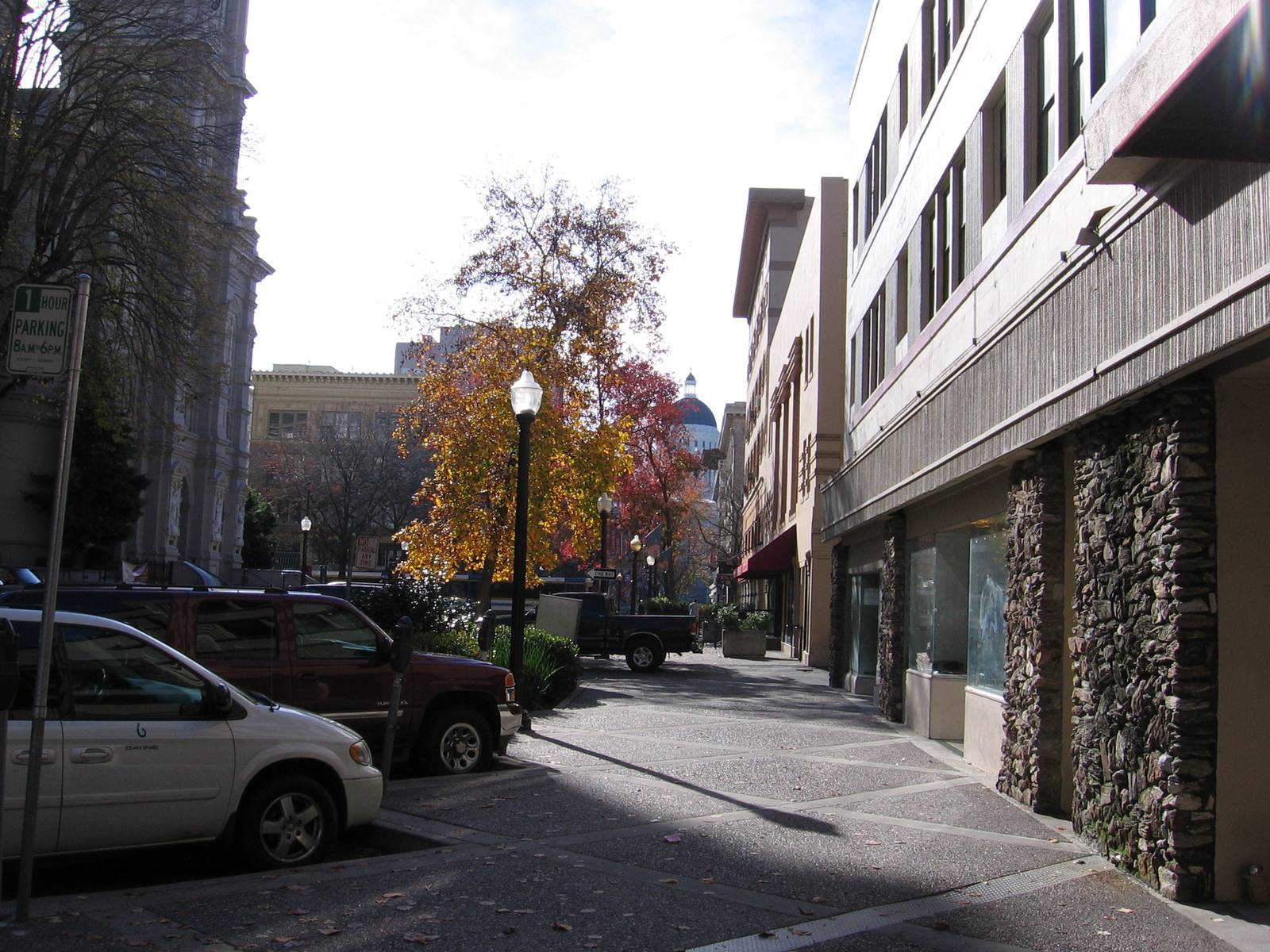 11th Street in Sacramento, with the dome of the California State Capitol in the distance.