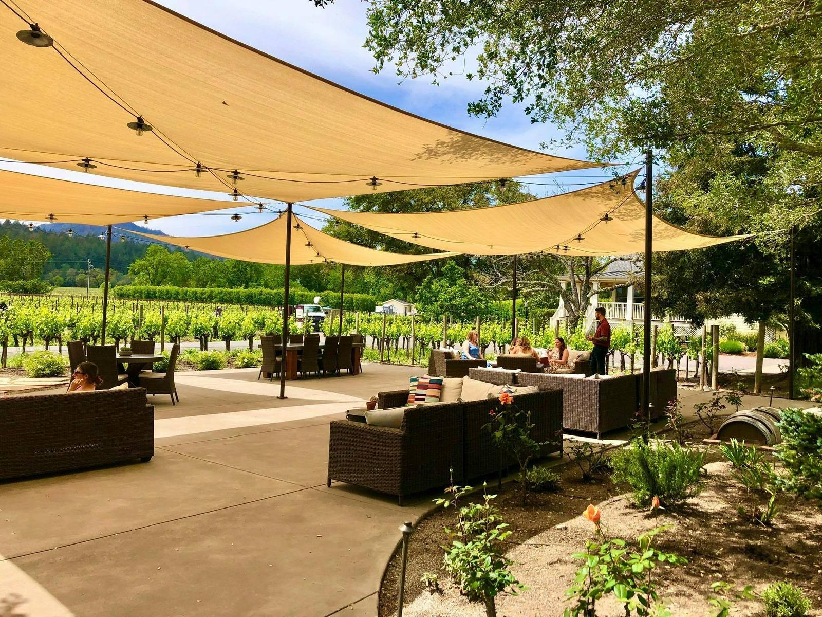 Shade sails over the tasting patio at Benessere Vineyards in St. Helena.