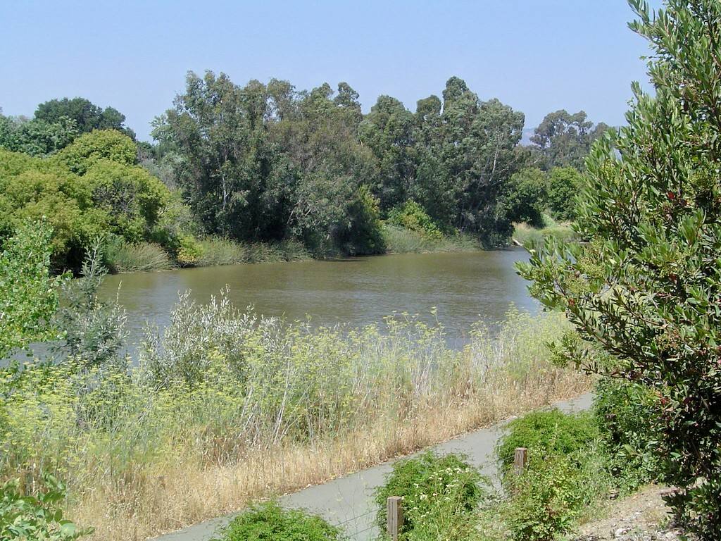 The Napa River in Napa. The Weather Service advises drinking water consistently, checking on elderly and isolated neighbors, and never leaving children or pets in parked vehicles.