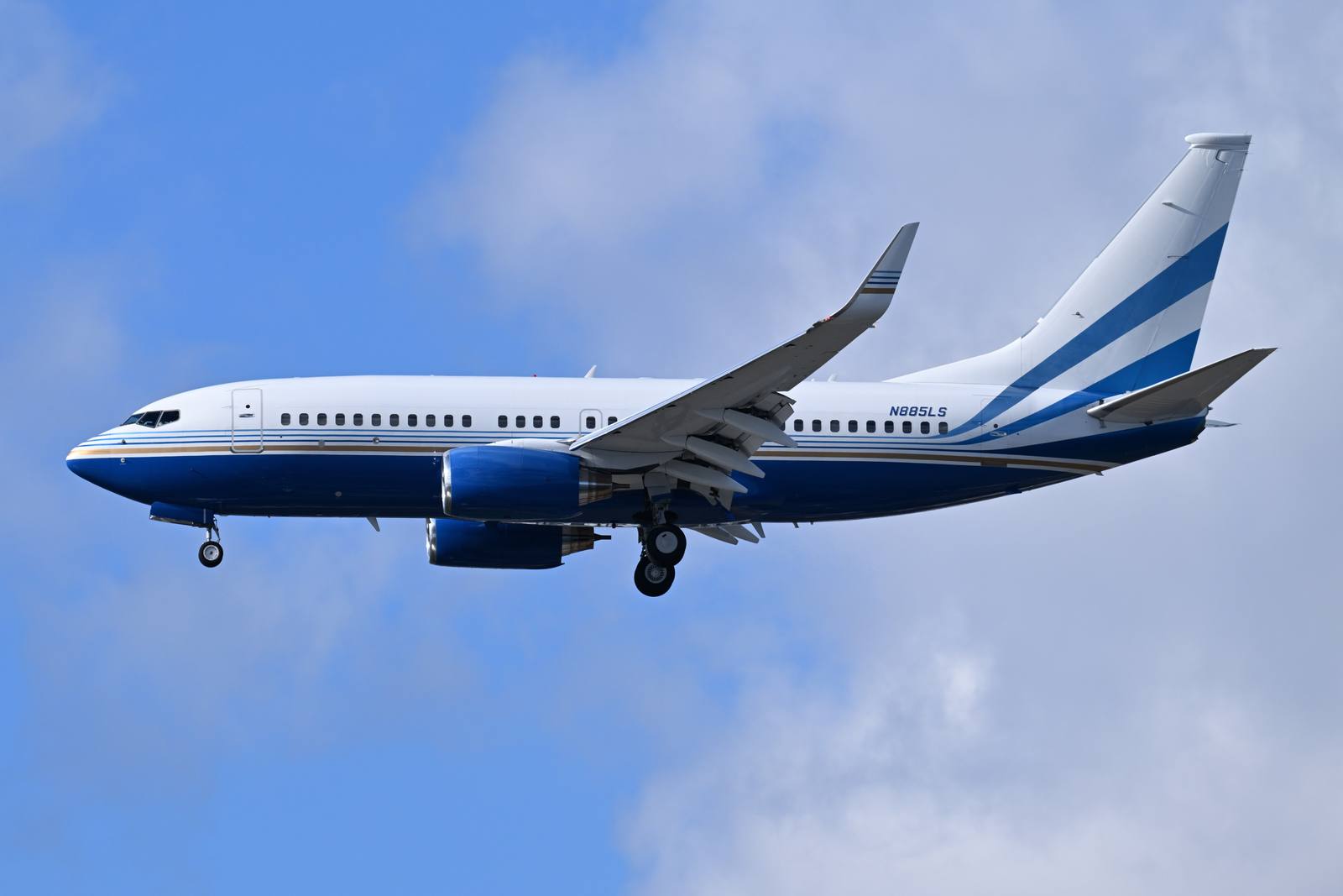 A business jet on final approach. Residents have described jet arrivals flying low and minutes apart under the current published approach.